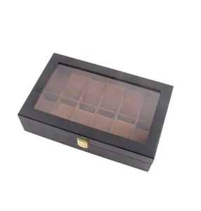 High-angle view of a 12-slot black wooden watch storage box with clear glass lid display