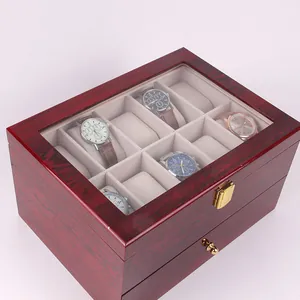 Detail view of the 20-slot wooden watch box with a high-gloss reddish-brown finish.