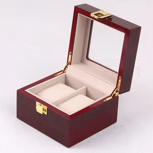 Detailed macro view of glossy mahogany watch box with soft beige velvet 2-slot interior