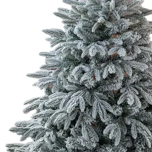 Detailed close-up shot of a 1.8m deluxe frosted artificial Christmas tree with heavy snow