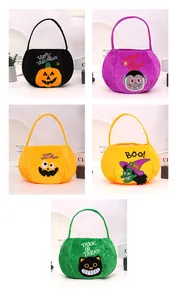 Five colorful Halloween plush candy bags with pumpkin, witch, and vampire embroidery