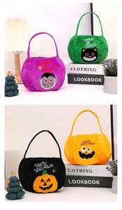 Colorful soft plush Halloween candy bags featuring embroidered pumpkin and cat designs