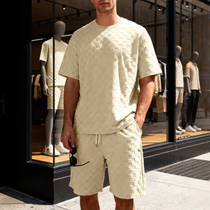Detail van de dambord jacquard textuur van de beige heren sportset