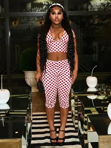 Stylish red and white polka dot 3-piece women's set featuring crop vest and capri pants