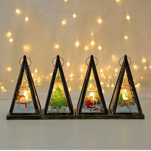 Set of 4 triangular Christmas lanterns with glowing LED candles and festive character patterns