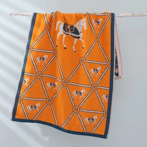 Orange four-layer cotton gauze bath towel with equestrian horse and H pattern design