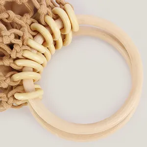 Bolso de red de cuerda de algodón tejido a mano con asas circulares de madera