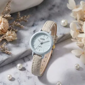 Elegant GEDI women's quartz watch with ice blue dial and beige textured leather strap