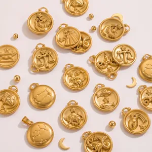 Selection of 18K gold-plated zodiac pendants with embossed signs and constellations.