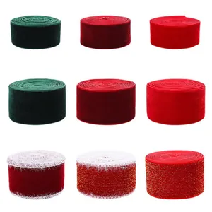 Assorted red and green velvet Christmas ribbons for gift packaging and DIY holiday crafts