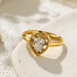 Detailed macro shot of a pear-cut zircon stone set in a luxury gold frame ring