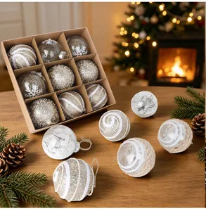 Close-up of elegant Christmas ball ornaments with hemp rope and pearl accents in a box