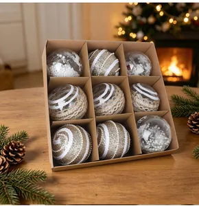 Detailed view of nine-piece Christmas bauble set with rustic twine and glitter details.