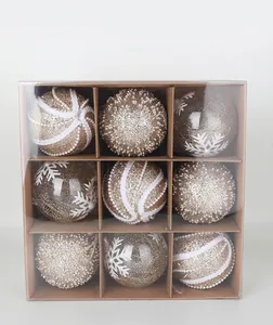 Close-up detail of Christmas ornaments set in 9-compartment packaging box