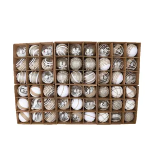 Assorted Christmas ball ornaments set with hemp rope and snowflake designs in boxes