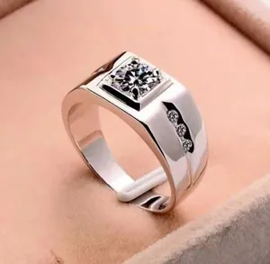Detail view of silver men's ring with a large square-set clear zircon stone