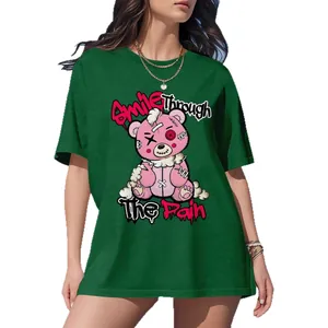 Green oversized T-shirt with pink bear print and Smile Through The Rain text