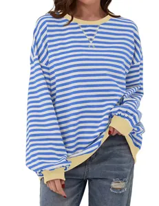 Casual women's blue and white striped long sleeve shirt with yellow ribbed detail