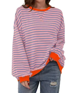 Casual striped long-sleeved top for women featuring vibrant orange trim and round neck.