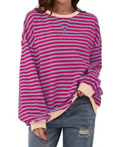 Casual round neck long-sleeved top with red and blue stripes and peach ribbed cuffs