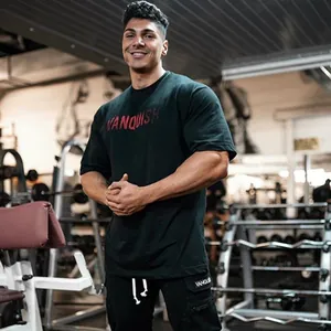 Professioneel zwart katoenen fitness T-shirt met opvallende Vanquish print op de borst