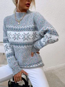 Detail shot of a women's semi-high collar Christmas sweater with snowflake patterns.