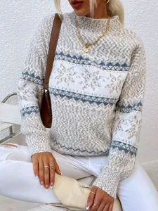 Close-up of women's semi-high neck sweater with fuzzy snowflake pattern knit details.
