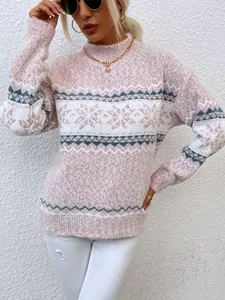 Detailed view of the pink snowflake knit pattern on a women's semi-high neck sweater