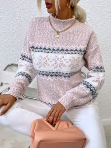 Elegant pink Fair Isle knitted sweater with snowflake pattern for cozy winter fashion.