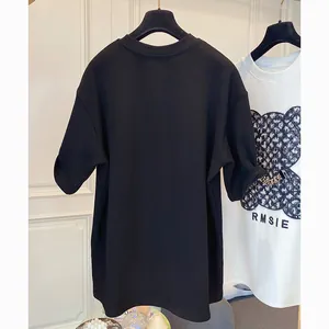 Classic minimalist black pure cotton short-sleeved T-shirt for women shown from the back