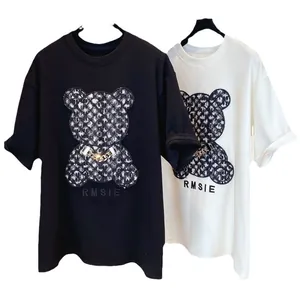 Oversized cotton T-shirt for women featuring a stylish checkered bear print