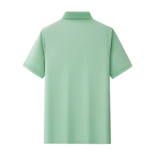 Detailed back view of a mint green short-sleeve business polo shirt in breathable pique