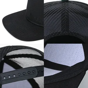 Primer plano detallado de gorra trucker de 7 paneles con cierre de presión y malla.