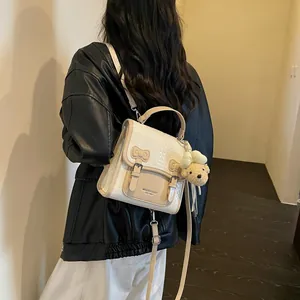 Stylish woven white backpack worn with black leather jacket for a trendy look.