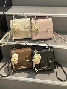 Trendy Korean style casual women's mini backpack with plush bear keychain in four colors