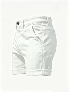 Detailed side view of white tight denim shorts with cuffed hem and button fly design