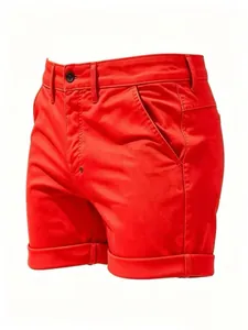Detailed view of vibrant red slim-fit casual shorts with rolled cuffs and button fly.