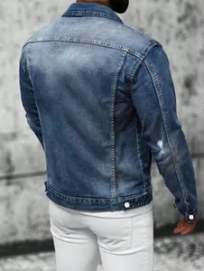 Back view of men's slim fit blue denim jacket with vintage wash and distressed detail