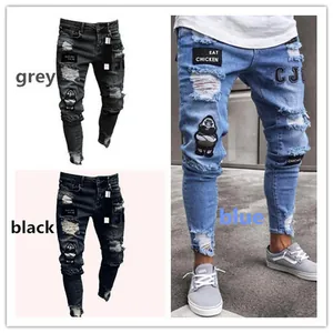 Men's distressed skinny jeans in grey, black, and blue with patches.
