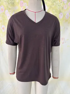 Detailed front view of brown V-neck loose fit casual t-shirt displayed on mannequin