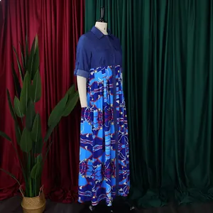 Detail shot of the denim patchwork and chain print on the plus size maxi dress.
