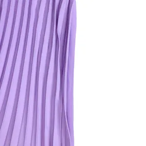 Close-up view of elegant purple pleated fabric showing high-quality texture and fine ruffles