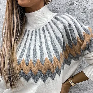 Close-up of women's turtleneck sweater with grey and brown geometric knit pattern