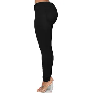 Detail view of black skinny jeans for women showing a sleek side silhouette fit