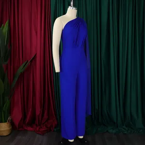 Side view showing an elegant royal blue one-shoulder formal jumpsuit on a dress form