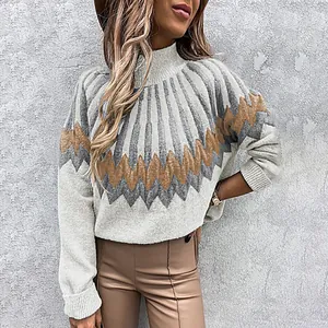 Detail of women's high-neck knit sweater with geometric zigzag print in neutral tones