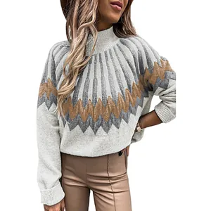 Detailed view of the geometric chevron pattern on this cozy high-neck knit sweater for women.