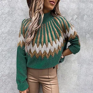 Close-up detail of the green and brown geometric pattern on a women's knit turtleneck sweater