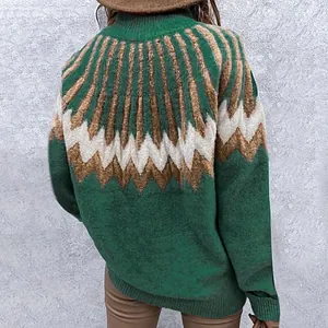 Back view detail of loose green high neck knitted sweater with geometric zigzag patterns