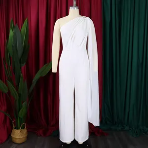Elegant white one-shoulder jumpsuit with long draped cape detail for evening party